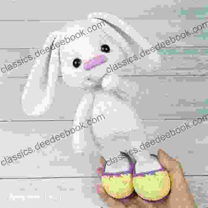 Crochet Bunny With Floppy Ears And A Carrot In Its Paws, Symbolizing The Playful Joy Of Springtime. Crochet Projects: 84 Beautiful Crochet Decorations And Clothes Pieces For Any Time Of The Year